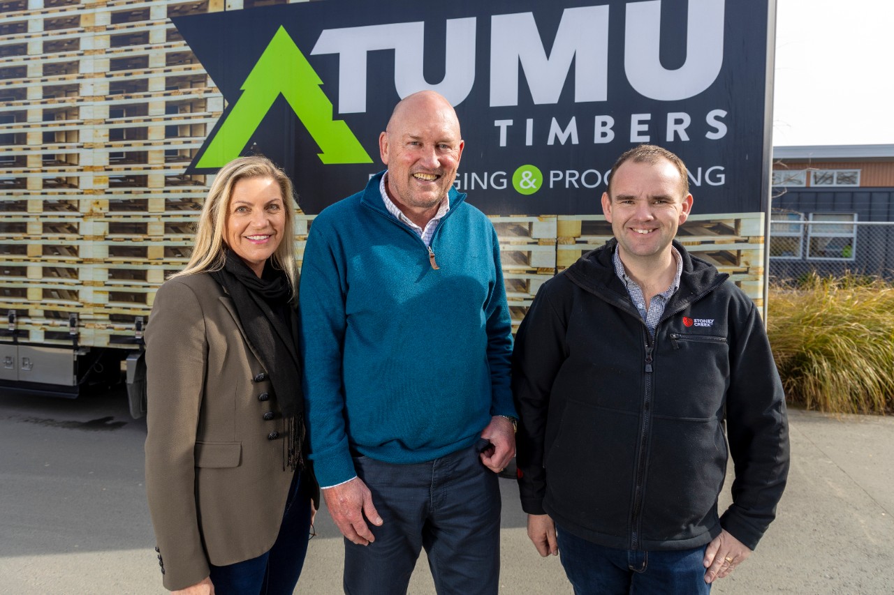 Tumu Group Managing Director and The Evergreen Foundation Trustee John O'Sullivan, centre, with Michelle O'Sullivan, left, and Tumu Transport Manager Bevan Hall.